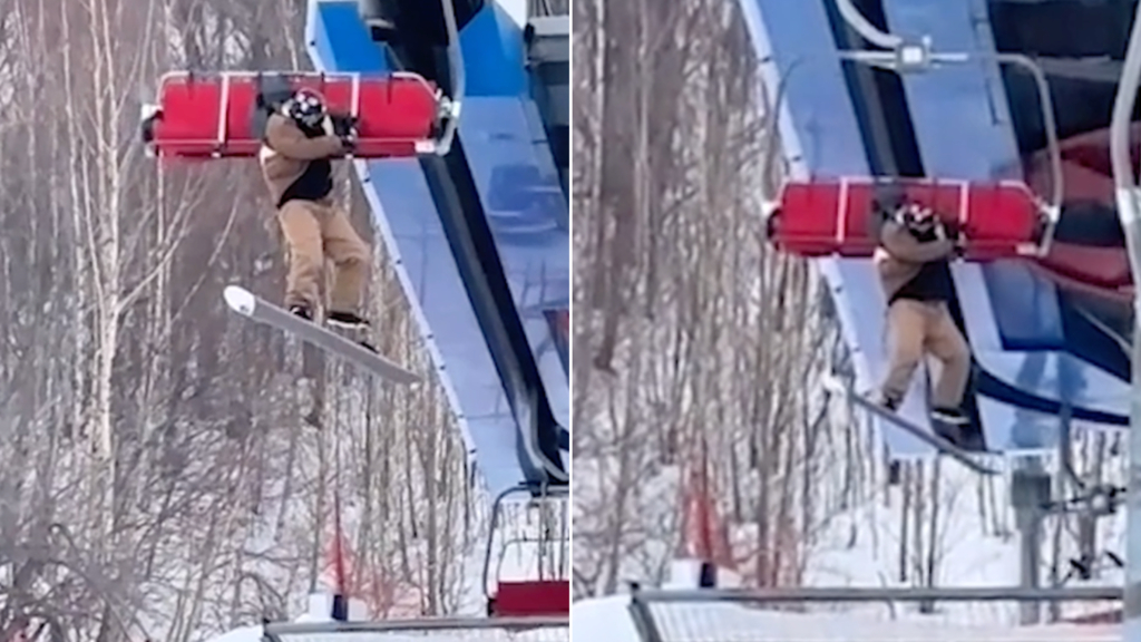 Snowboarder rimane appeso sulla seggiovia: il video da cardiopalma